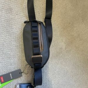 TUMI men's sling bag NWT